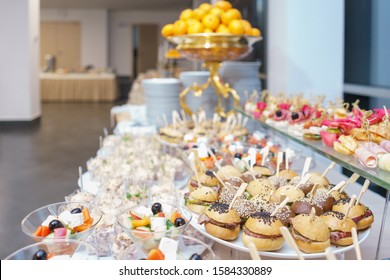 Catering and guest meals during the event. Quick mini snacks in a special beautiful dish. Canapes and light meals, tapas on the table in the restaurant.