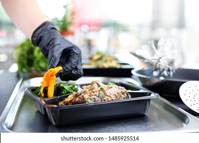 Catering. Meal Prep.The Cook Prepares Take-out Dishes.