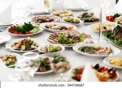 Catering Service. Restaurant Table With Food. Huge Amount Of Food On The Table. Plates Of Food. Dinner Time, Lunch.