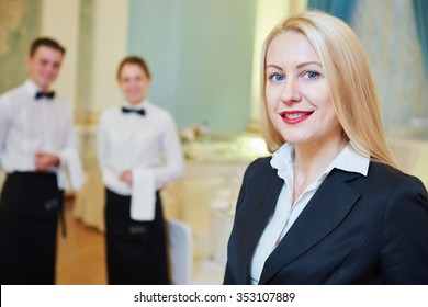 Catering Services. Restaurant Manager Portrait In Front Of Waitress And Waiter Staff At Banquet Hall