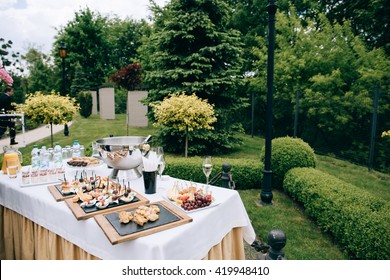 catering services in restaurant. Wedding table reception on wedding ceremony in the park