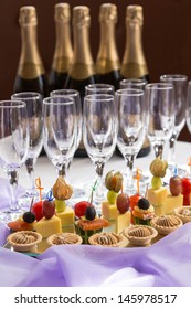 Catering Serving Buffet With Canapes And Champagne