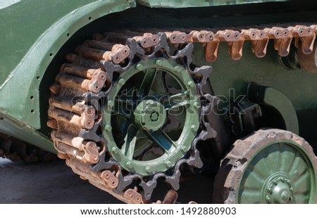 Caterpillar military tank rusty wheel or sprocket excavator