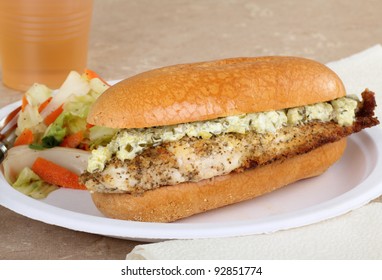 Catfish Fillet Sandwich On A Bun With Sauce