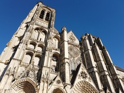 Saint-Étienne Cathedral In Bourges France And His Forefront Is A Gothic Style Catholic Cathedral Built Between The End Of The 12th And The End Of The 13th Century With A Beautiful Blue Sky