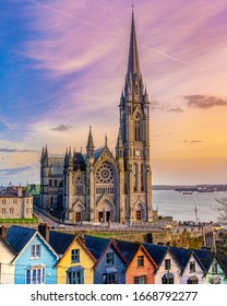 The Cathedral Church of St Colman, is a Roman Catholic cathedral in Cobh, Ireland. It overlooks Cork harbour. Construction began in 1868. The houses in front are know as Deck of Cards houses.