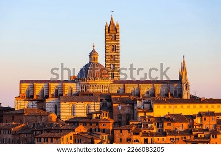 Cathedral of the City of Siena in Tuscany region of Italy at sunset