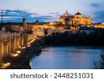The Cathedral and Great Mosque of Cordoba (Mezquita) and Roman Bridge at twilight, UNESCO World Heritage Site, Cordoba, Andalucia, Spain, Europe