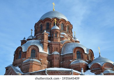 Cathedral Of The Icon Of The Mother Of All Who Sorrow. Red Brick Orthodox Church At Winter With Snow On The Roof. Sviyazhsk Near Kazan Tatarstan. Blue Clear Sky At Winter Day