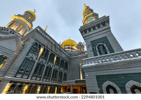 Cathedral mosque in Moscow, Russia. Islamic religious architecture. Mosque minaret. Moscow architectural landmark, monument. Beautiful Moscow Cathedral mosque.
