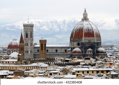 Cathedral Santa Maria del Fiore (Duomo) and Giotto's Bell Tower (campanile), in winter with snow Florence, Tuscany, Italy