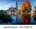 The cathedral of Uppsala next to magnificent fall colors