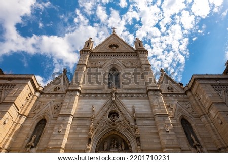 Catholic Cathedral in Naples Italy “Cattedrale di Santa Maria Assunta“ with impressive renovated facade. Frog perspective of important church in old town “Centro storico Napoli“ – Monument and sight.