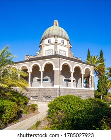 Catholic Church of the Beatitudes of the Franciscan monastery. The Mount Bliss on the Sea of Galilee. Israel. Blooming huge park around the monastery. The concept of religious pilgrimage 