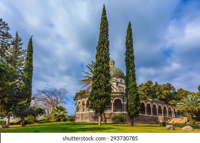 Catholic monastery and a small church Mount of Beatitudes. Beautiful park of cypress. Israel, the shores of Lake Kinneret