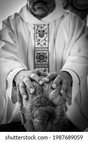 Catholic Priest Hands Giving The Blessing After Confession. Sacraments Of The Catholic Christian Religion In Church.