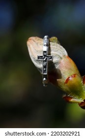 Catholic Rosary Ring Around A Chestnut Bud In Spring. Religious Symbol.