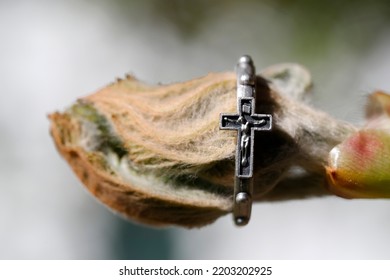 Catholic Rosary Ring Around A Chestnut Bud In Spring. Religious Symbol.