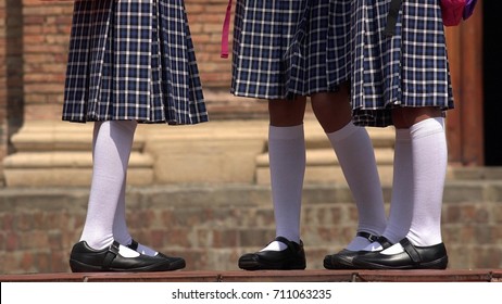 Catholic School Girls With Skirts And White Socks