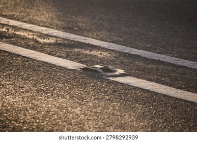 Cats Eye Located on solid white line indicating the centre of a carriageway where overtaking is forbidden