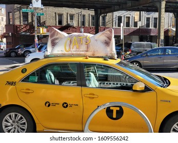 Cats Movie Advertisement On Top A NYC Taxi Cab, Photographed In Brooklyn On The Corner Of 12th Avenue And New Utrecht Avenue On Jan 5th 2019.