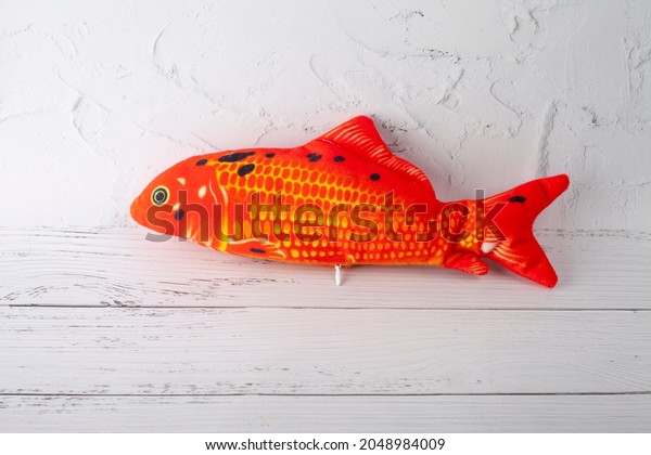 Cat\'s toy fish isolated on white\
background.Products for\
cats.