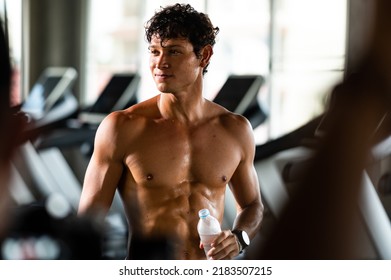 Caucasian Athlete Man Person Drink A Bottle Of Fresh Water After Workout In Sport Gym, Adult Male Exercise In Fitness For Building Strong Body, Take A Break Of Muscular Healthy Training Lifestyle