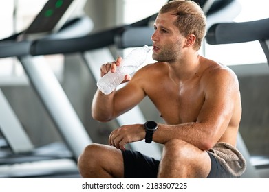 Caucasian Athlete Man Person Drink A Bottle Of Fresh Water After Workout In Sport Gym, Adult Male Exercise In Fitness For Building Strong Body, Take A Break Of Muscular Healthy Training Lifestyle