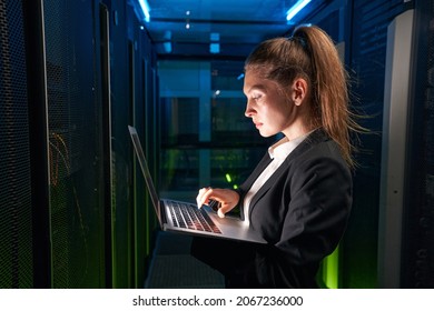 Caucasian Attractive Woman Use Laptop In Datacenter