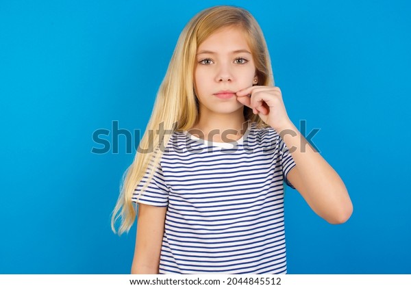 Caucasian Blonde Kid Girl Wearing Stripped Stock Photo 2044845512 ...