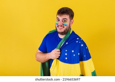 Caucasian Brazilian Man, Soccer Fan From Brazil, Wearing Brazil Flag Cape.