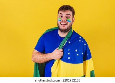 Caucasian Brazilian Man, Soccer Fan From Brazil, Wearing Brazil Flag Cape.