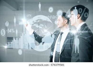 Caucasian businesspeople drawing abstract digital interface with business charts and HR icons. Technology concept