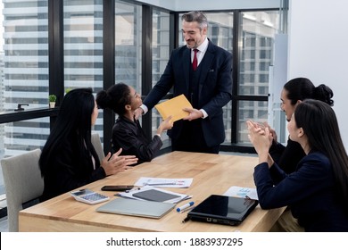 Caucasian CEO Giving Special Prize Or Incentive To Employee With Congrat Colleague.CEO Giving Extra Bonus To Employee.