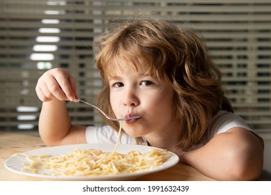 Caucasian Child Eating Pasta, Spaghetti. Kids Funny Face.