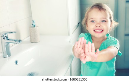 Caucasian Child Girl Showing Clean Washed Hands,kid Washing Hands In Bathroom.