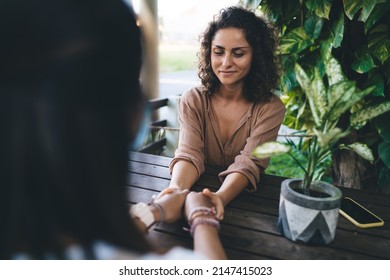 Caucasian coacher have theta holistic healing session with client enjoying time for talking and discussing questions during weekend pastime, female friends discussing trust and esoteric assistance - Shutterstock ID 2147415023