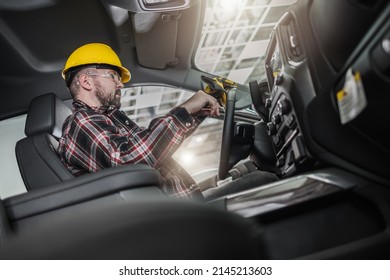 Caucasian Construction Contractor Worker In His 30s Inside His Brand New Pickup Truck. Commercial Vehicles Fleet Theme.