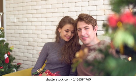 Caucasian Couple Celebrate Early Christmas Morning