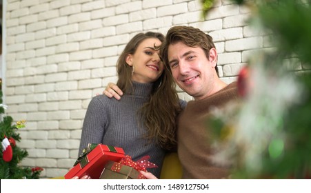 Caucasian Couple Celebrate Early Christmas Morning