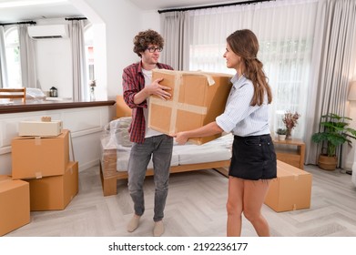 Caucasian Couple Holding Box Move In New House