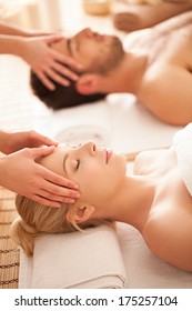 Caucasian Couple On A Head Massage.