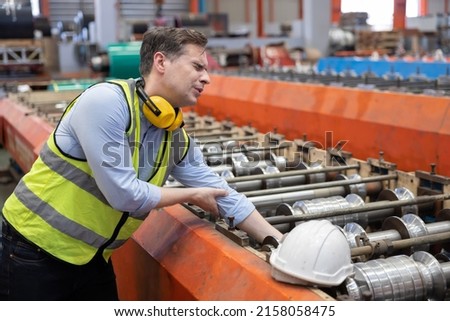 Caucasian Engineer Worker Hand Got Trapped in the Industrial Machine and Got Crush Injury