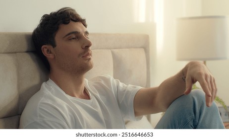 Caucasian European man pensive thoughtful thinking sadness bored bedroom bed home male tired guy failure grief loneliness upset sigh contemplation boredom reflection solitude frustration exhaustion - Powered by Shutterstock