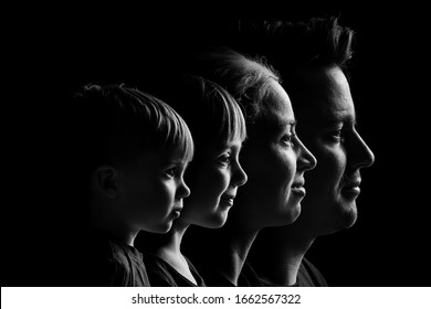 Caucasian Family Portrait In Black And White. Mom Dad Daughter And Son. Caucasian Family With Two Children.