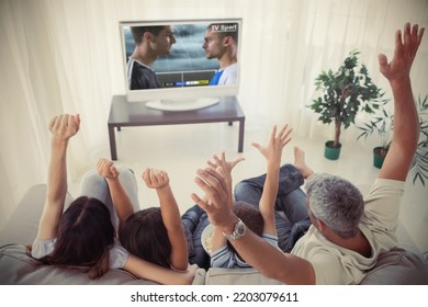 Caucasian Family Watching Tv With Football Match On Screen. Global Sport Concept, Digital Composite Image.