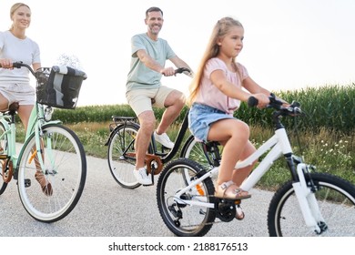 Caucasian Family While Bike Ride In The Woods