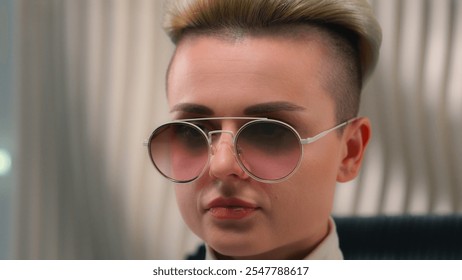 Caucasian fashion girl futuristic woman in eyeglasses white studio modern future innovation close-up cyber female model lady cyberpunk trendy eyewear stylish glasses relax on chair close eyes meditate - Powered by Shutterstock