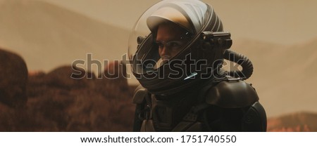 Caucasian female astronaunt wearing a space suit exploring red planet surface, Mars colonization concept