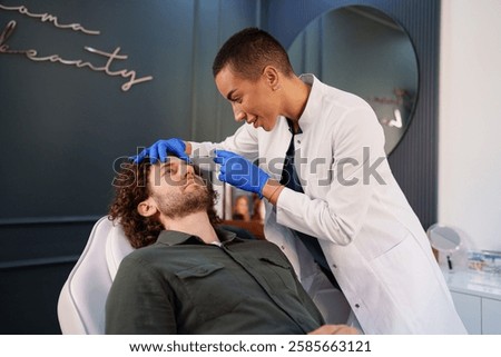 Similar – Image, Stock Photo Aesthetic Procedure Applying Botox, Hyaluronic Acid, and Tensor Threads